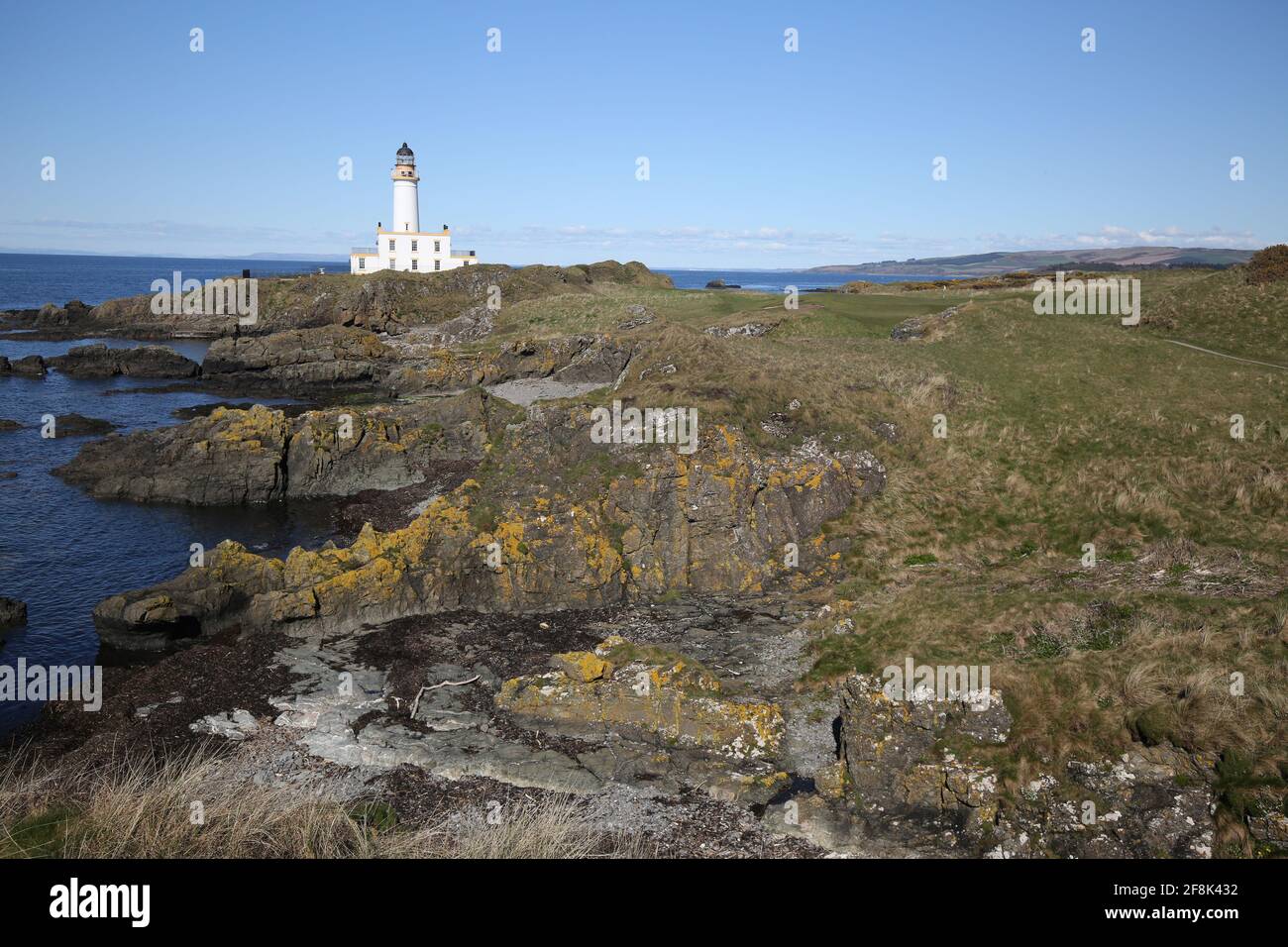 Scotland, Ayrshire Turnberry Ailsa Course 12 April 2021. The 9th Hole known as Bruce's Castle . A challenging Par 3 hole by the iconic lighthouse Stock Photo