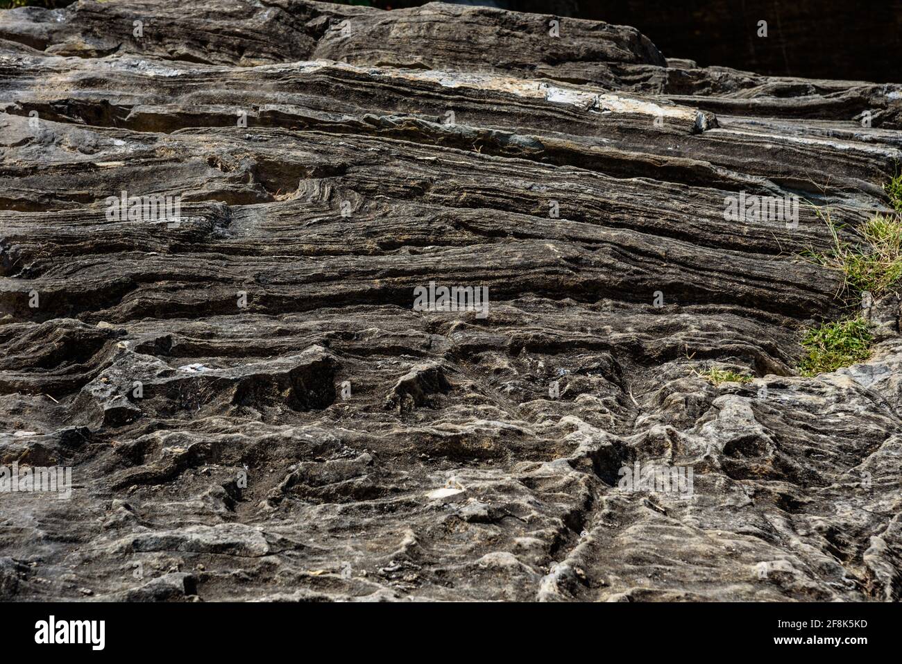 Layered intrusion is sill-like body of mafic igneous rock which exhibits vertical layering in Archean cratons due to convection,thermal diffusion, set Stock Photo