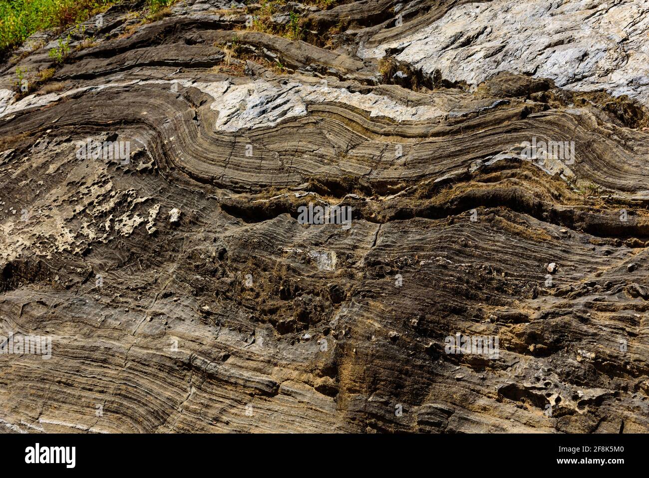 Layered intrusion is sill-like body of mafic igneous rock which exhibits vertical layering in Archean cratons due to convection,thermal diffusion, set Stock Photo