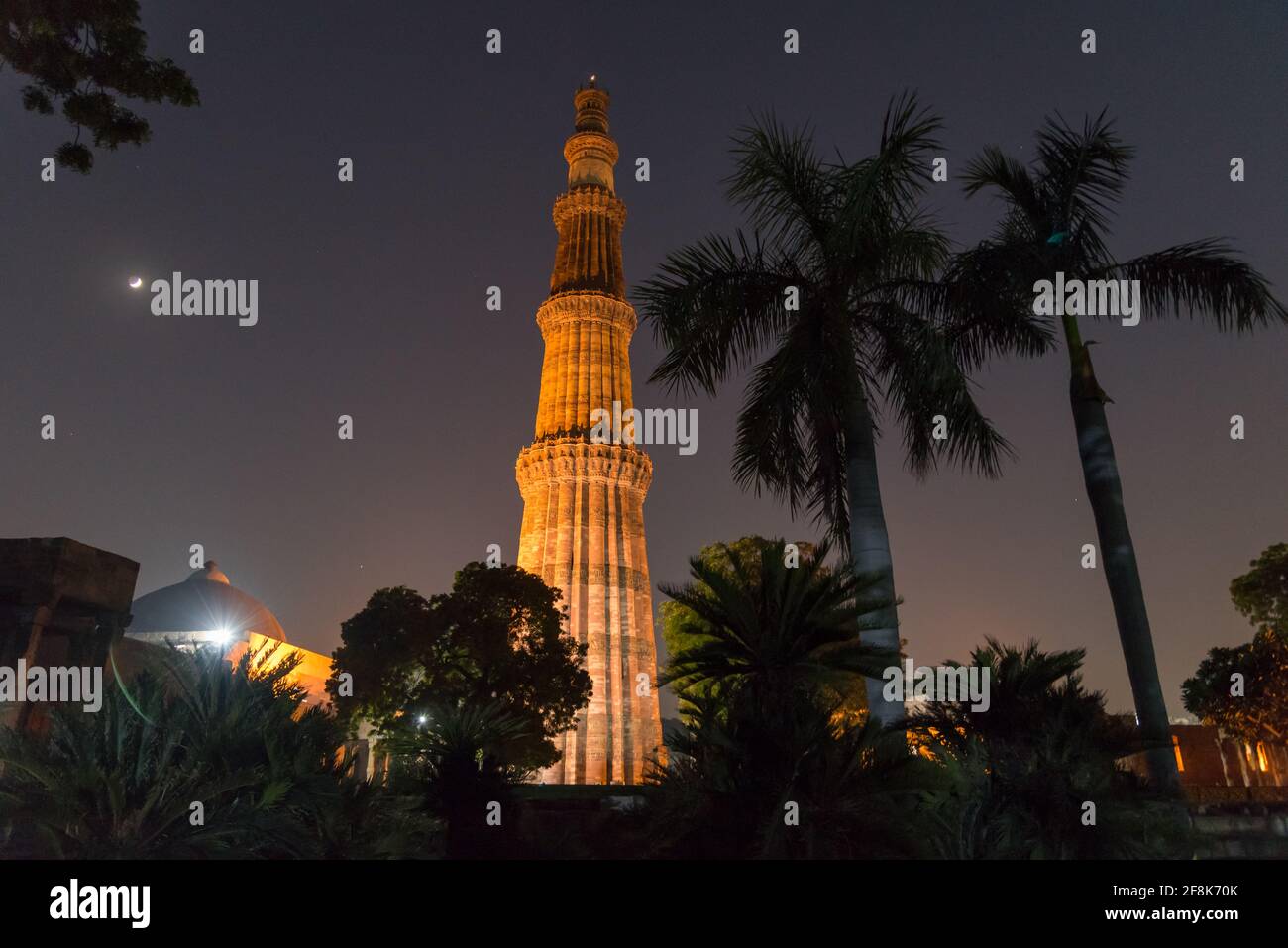 Silhouette of Qutub Minar a highest minaret in India standing 73 m tall tapering tower of five storeys made of red sandstone. It is UNESCO world herit Stock Photo