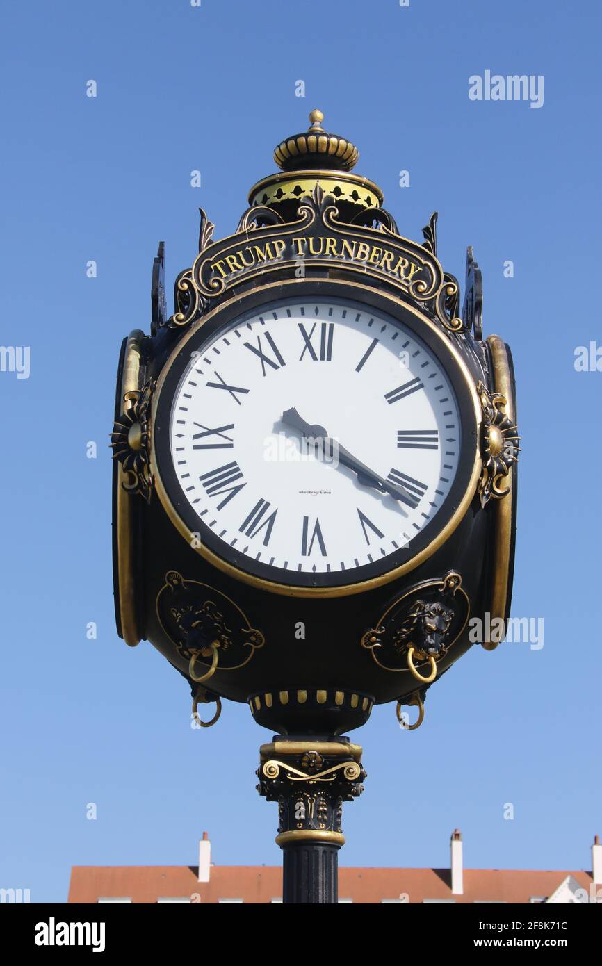Scotland, Turnberry, Ayrshire, 12 April 2021. Large clock outside Turnberry Club house with the name of Trump on it Stock Photo