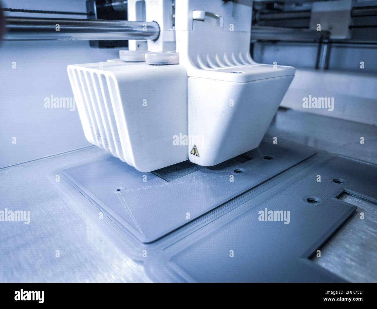 3D printer, printing with plastic wire filament in additive manufacturing technique. Stock Photo