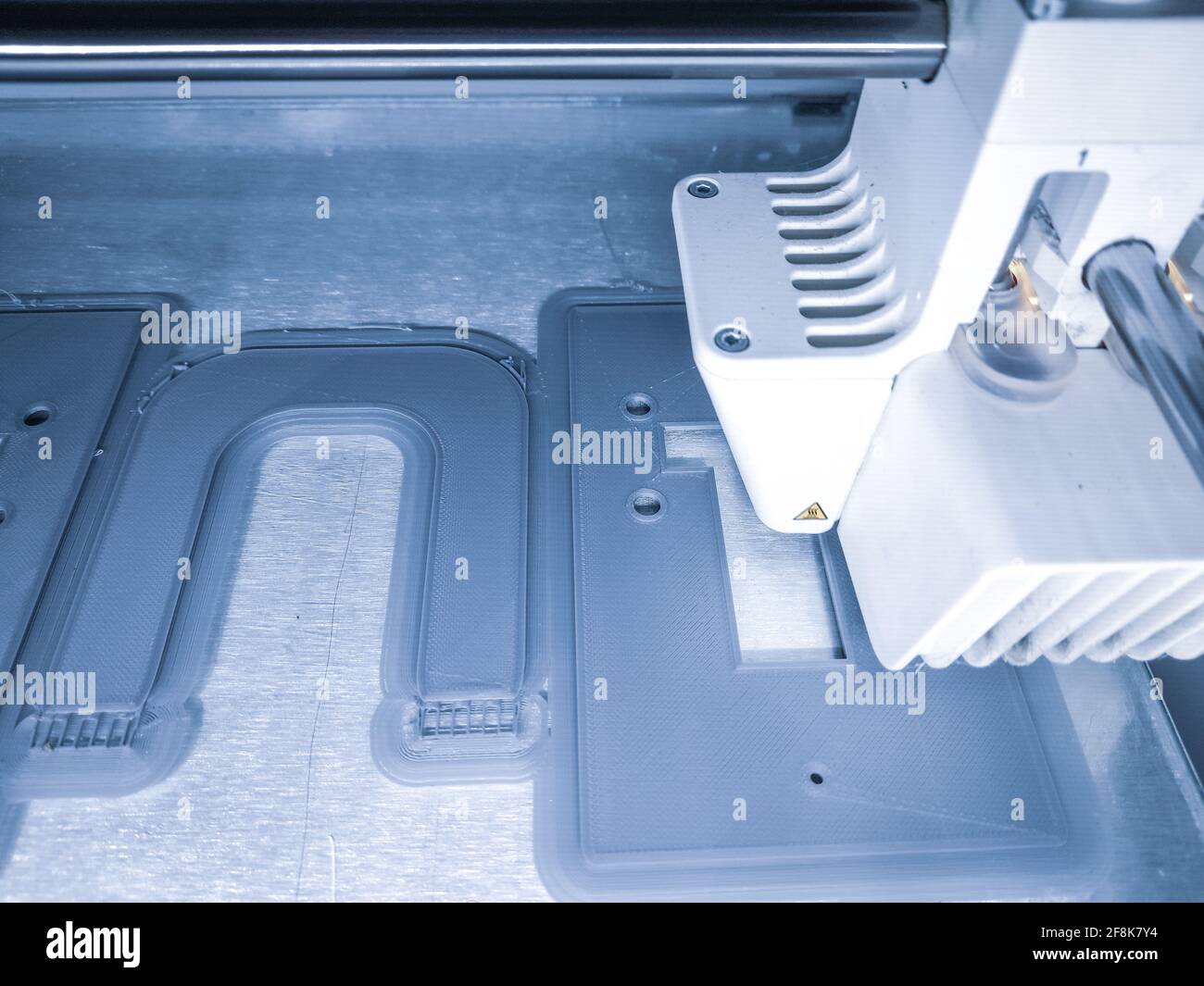 3D printer, printing with plastic wire filament in additive manufacturing technique. Stock Photo