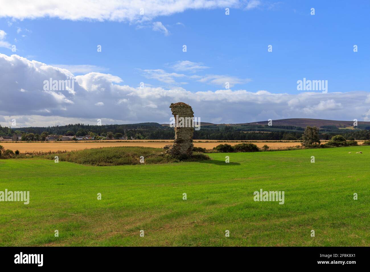 Open Scottish fields with remains of an old stone building standing amond them. Stock Photo