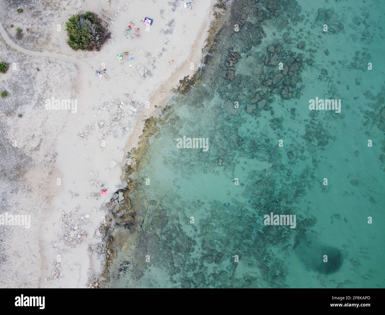 Aerial view of turquoise sea water at the beach Stock Photo - Alamy