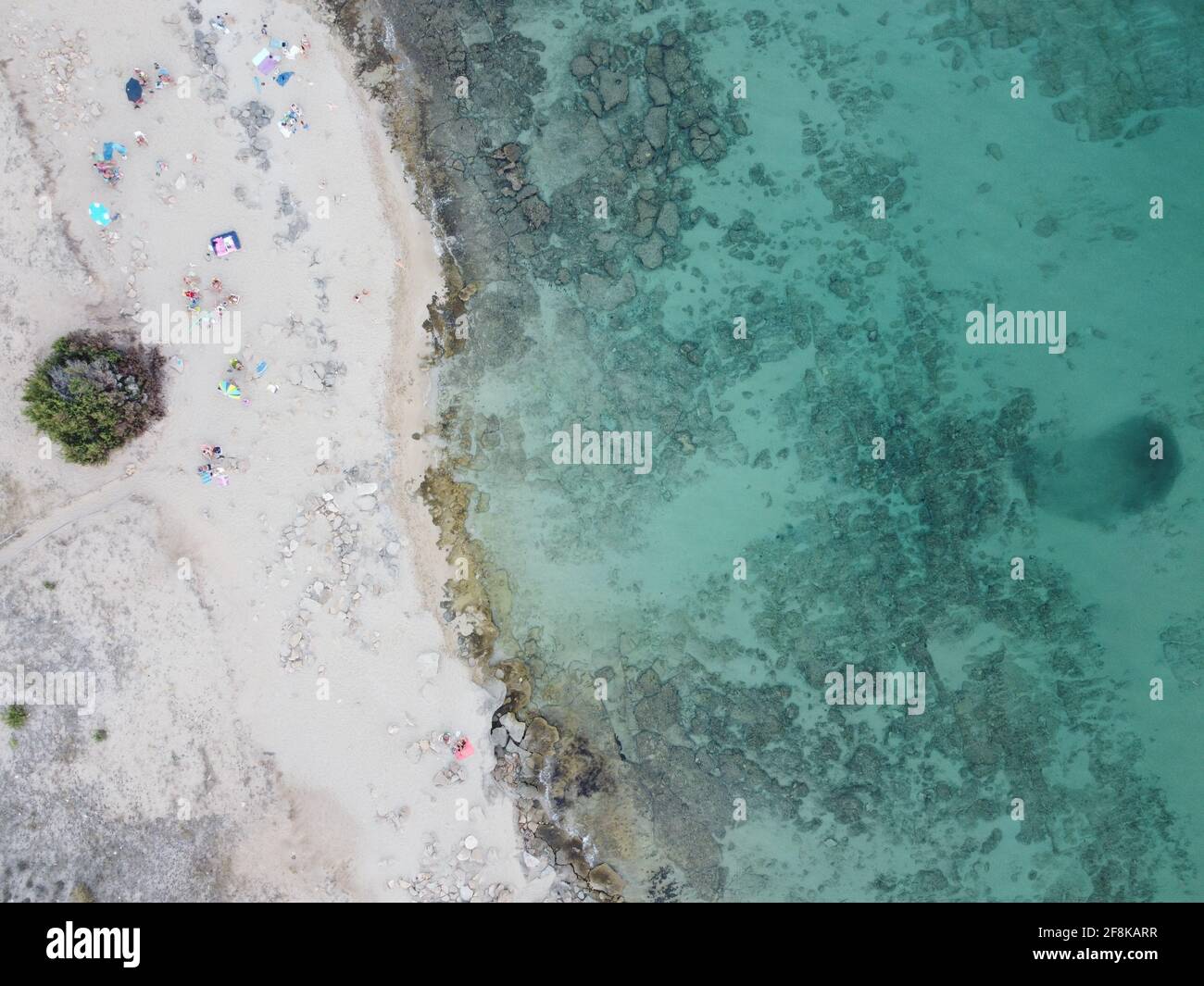 Aerial view of turquoise sea water at the beach Stock Photo - Alamy