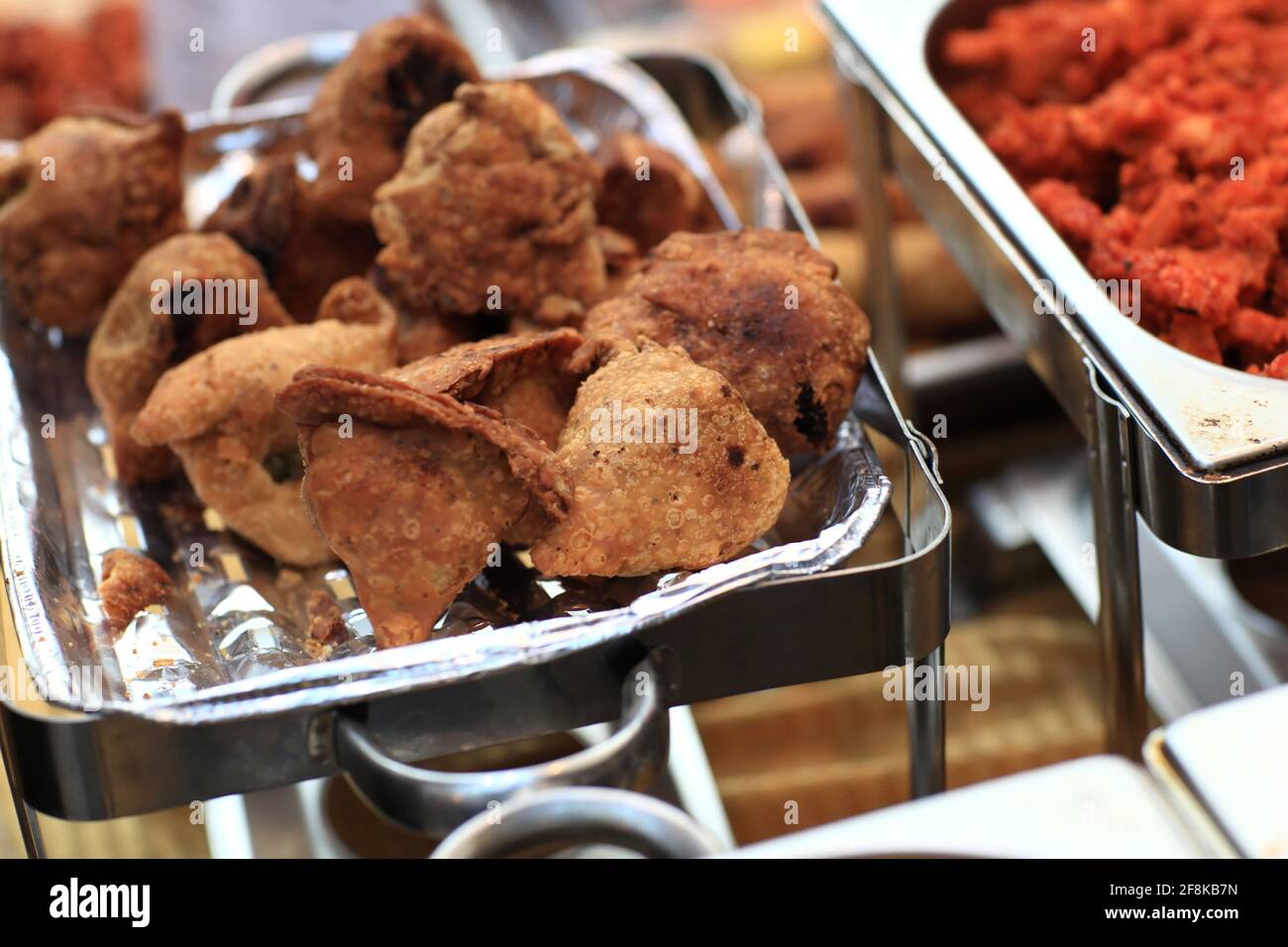 Samosa is a fried indian vegetable pastries Stock Photo - Alamy