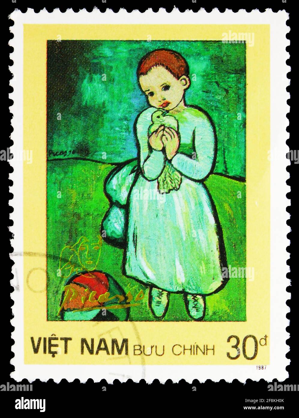 MOSCOW, RUSSIA - NOVEMBER 10, 2019: Postage stamp printed in Vietnam shows Child Holding a Dove, Picasso Paintings serie, circa 1987 Stock Photo