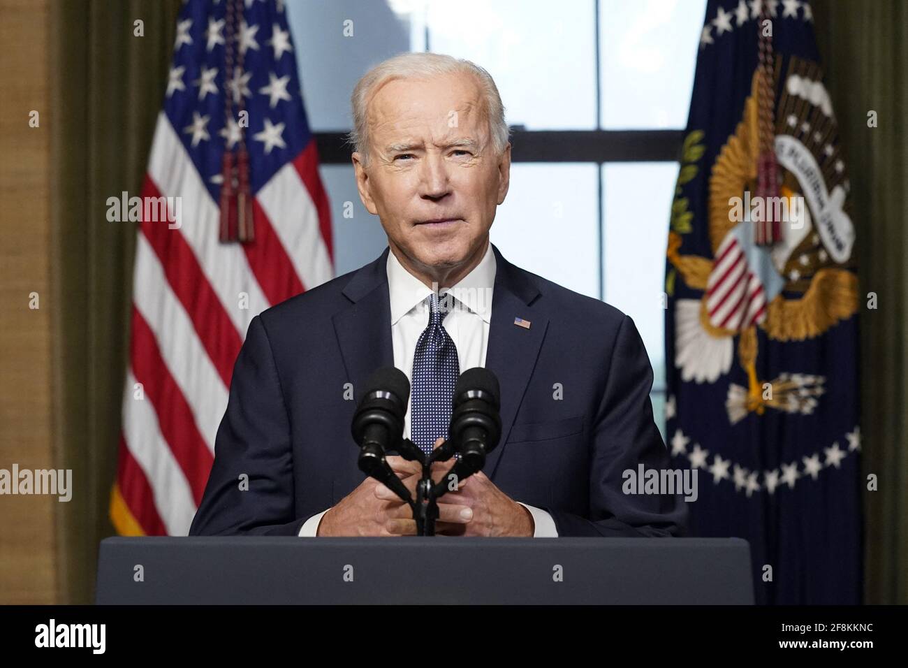 Washington, United States. 14th Apr, 2021. President Joe Biden speaks from the Treaty Room in the White House on Wednesday, April 14, 2021 about the withdrawal of the remainder of U.S. troops from Afghanistan. Pool Photo by Andrew Harnik/UPI Credit: UPI/Alamy Live News Stock Photo