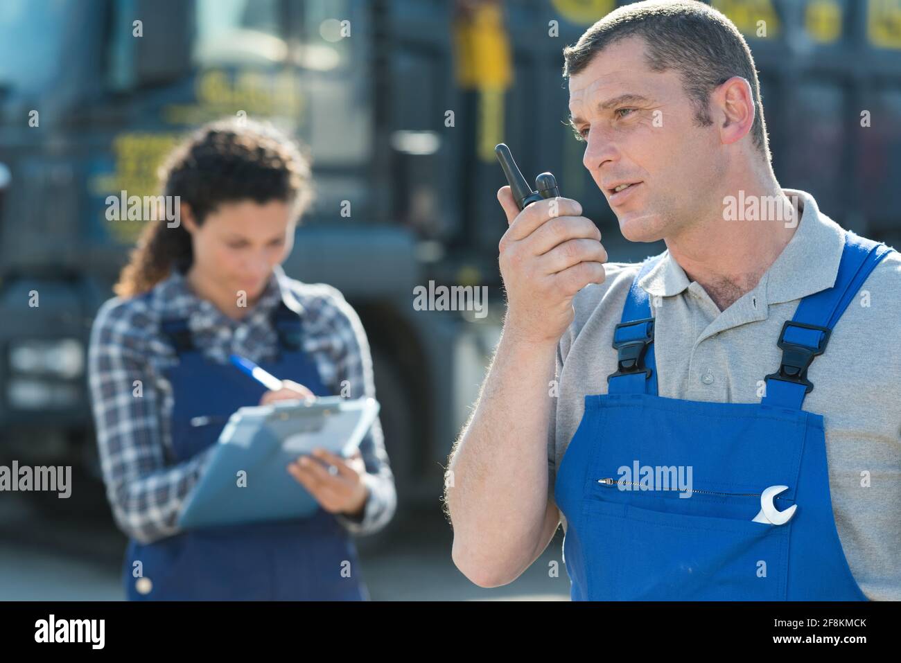 heavy equipment operator using walkie talkie Stock Photo Alamy