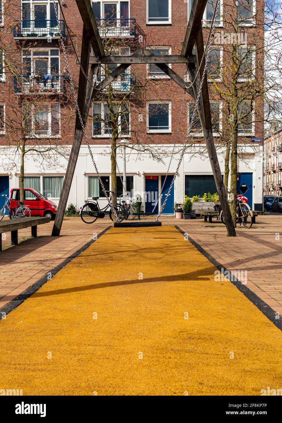 AMSTERDAM, THE NETHERLANDS, APRIL 11, 2021 A Swing in a public playground In Amsterdam Stock