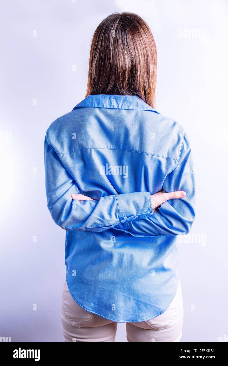 Arms crossed behind back hi-res stock photography and images - Alamy