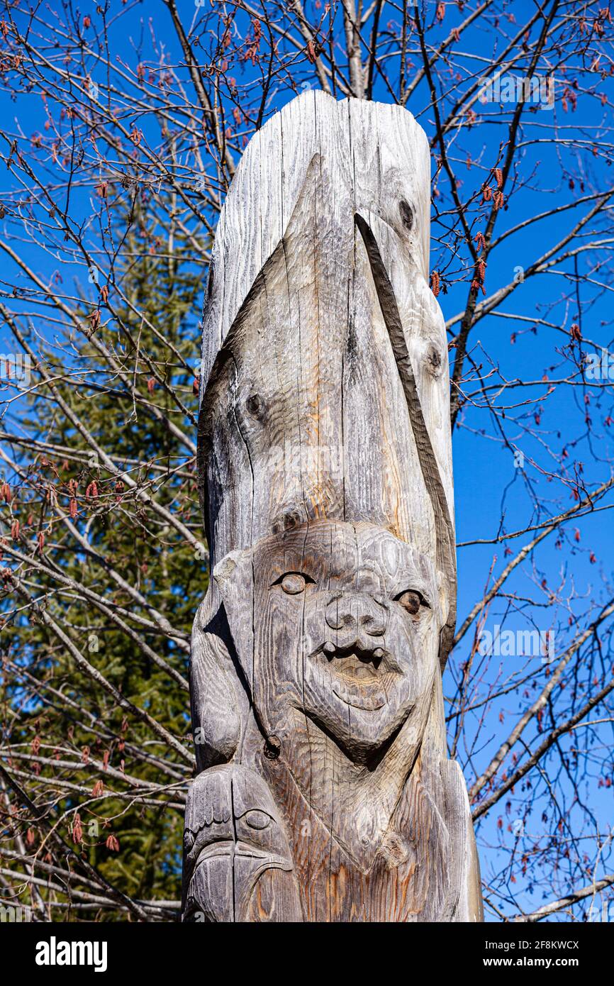 Carved totem pole at the entrance to the Squamish Cultural Centre in Whistler British Columbia Canada Stock Photo