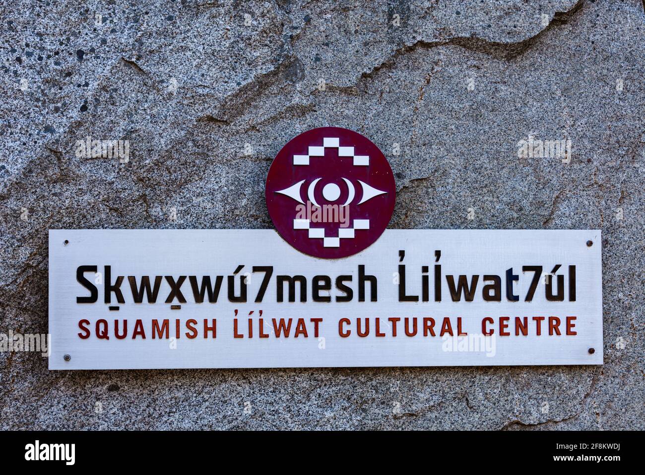 Entrance sign at the Squamish Cultural Centre showing spelling in the native language Whistler Village British Columbia Canada Stock Photo