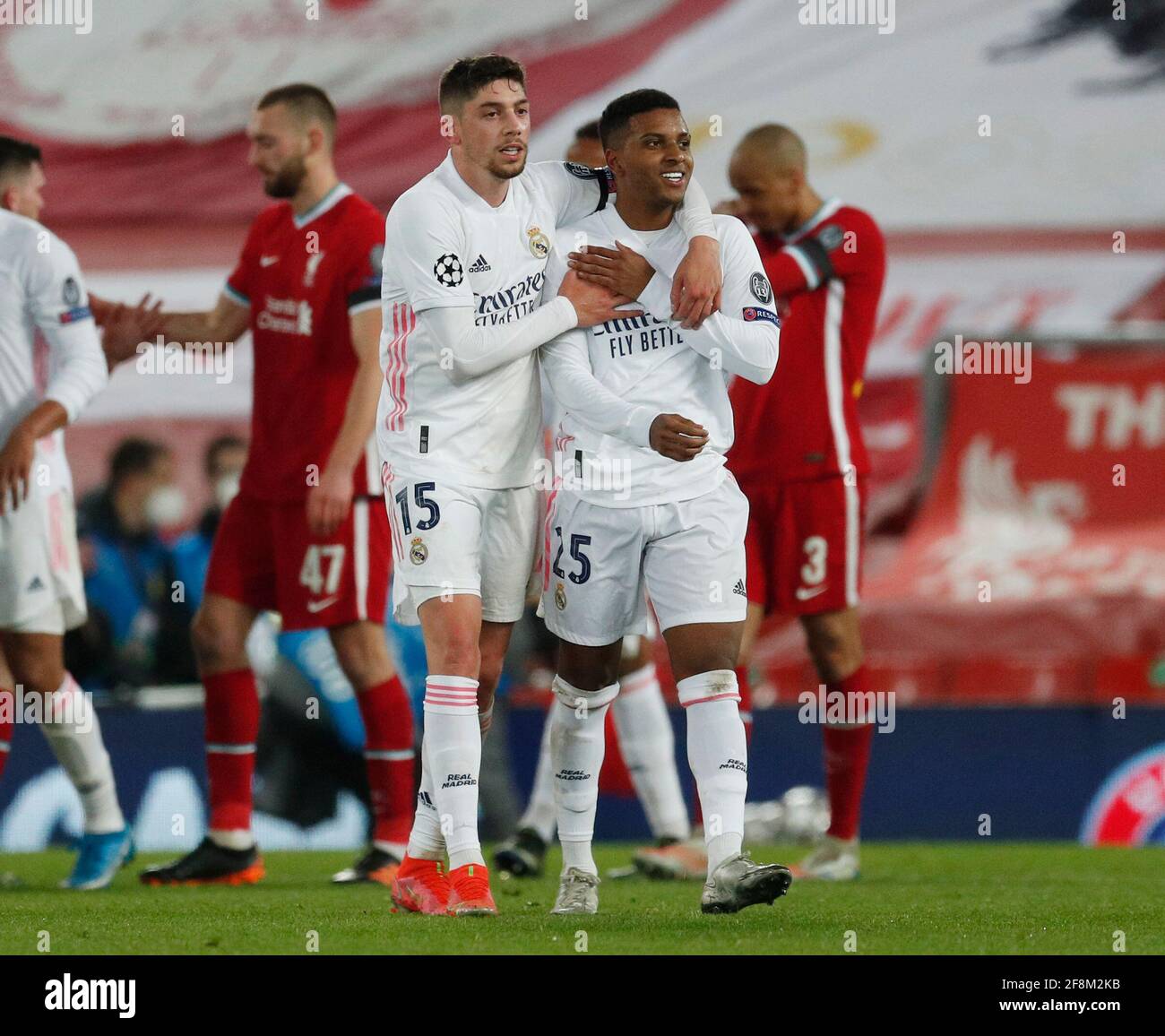 Liverpool, England, 14th April 2021. Federico Valverde and Rodrygo of Real Madrid celebrate the win during the UEFA Champions League match at Anfield, Liverpool. Picture credit should read: Darren Staples / Sportimage Stock Photo