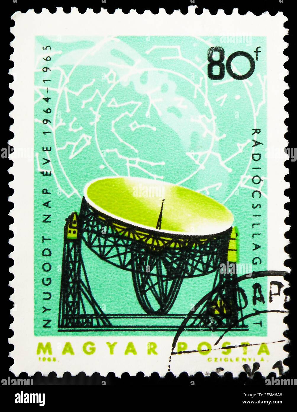 MOSCOW, RUSSIA - SEPTEMBER 30, 2019: Postage stamp printed in Hungary shows Telescope and map of Milky Way, International Quiet Sun Years serie, circa Stock Photo