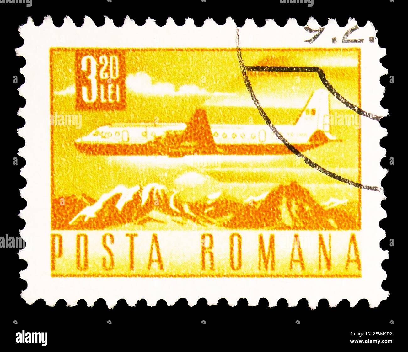 MOSCOW, RUSSIA - SEPTEMBER 30, 2019: Postage stamp printed in Romania shows Ilyushin Il-18 Airliner over Mountain Landscape, Postal and Transport seri Stock Photo