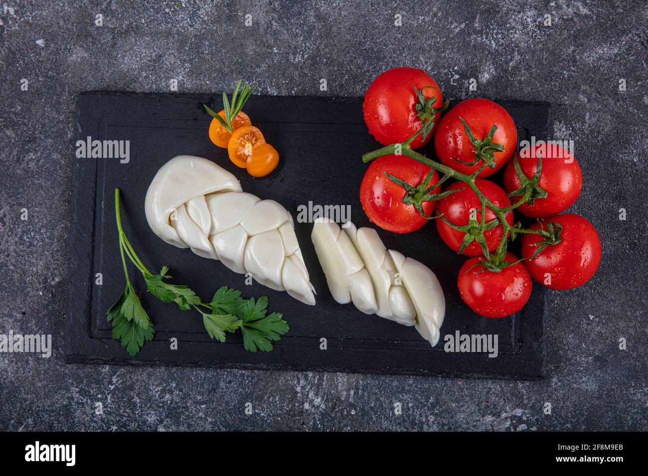Cheese braided braid. Fresh soft white buffalo buffalo milk mozzarella