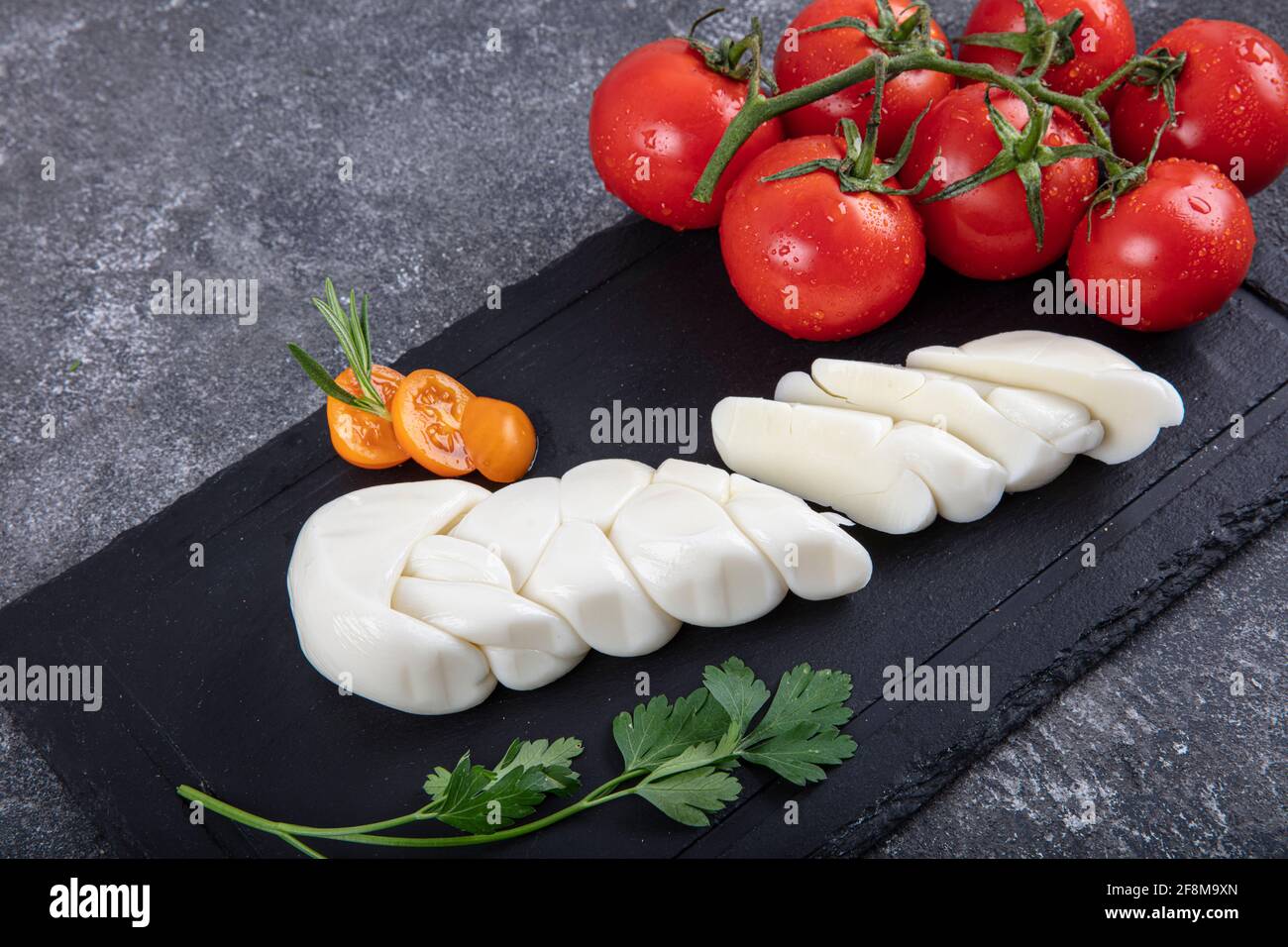 Cheese braided braid. Fresh soft white buffalo buffalo milk mozzarella