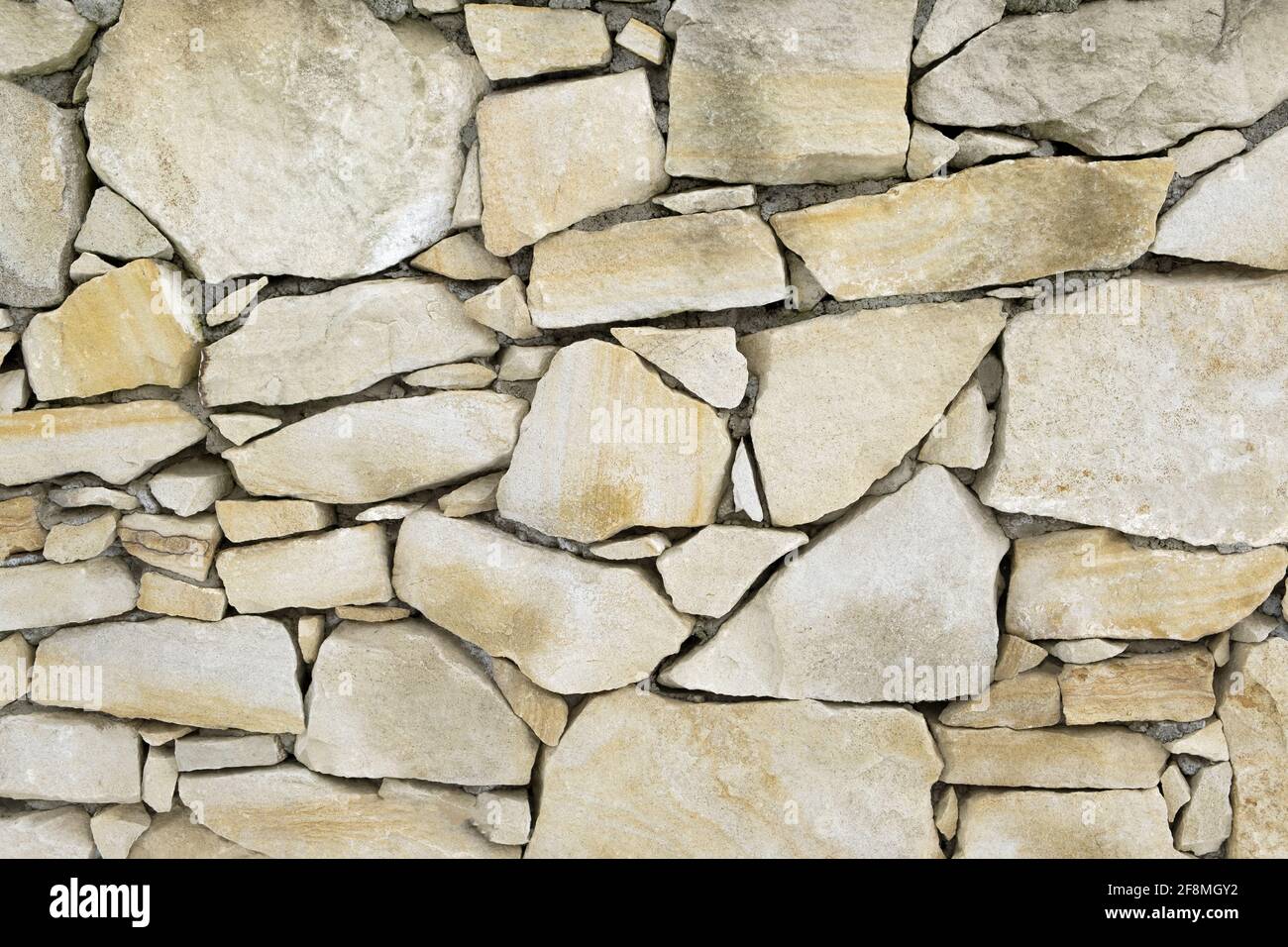 Old limestone material Seamless brick wall background Stock Photo