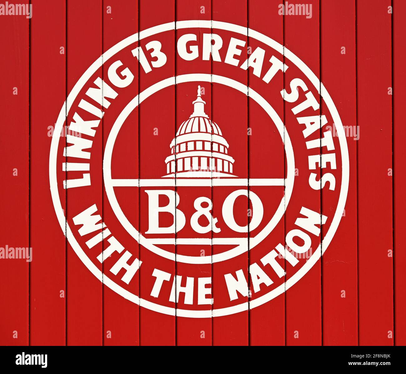 Logo for B&O Railroad painted on red wood panels in Ellicott City, Maryland. Stock Photo