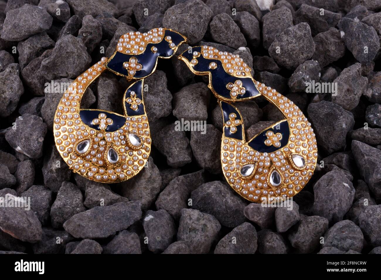 Beautiful Golden pair of earrings, pearls earrings , Bridal Gold earrings wedding jewellery Stock Photo