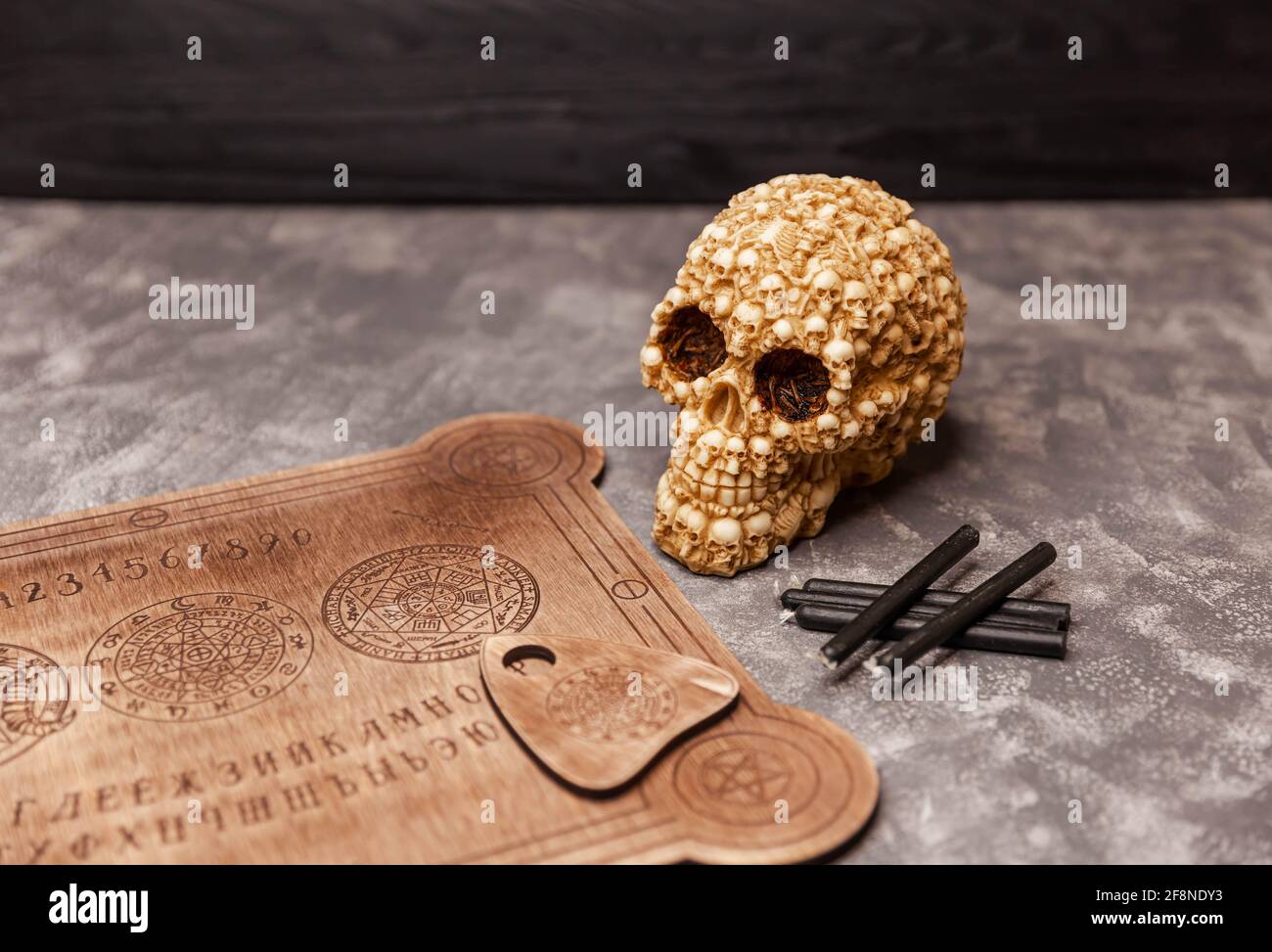 Talking board used on seances for communicating with the dead. Stock Photo