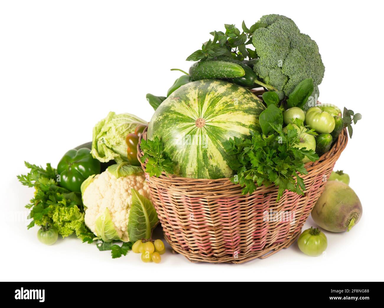 Fresh green vegetables in a wicker basket Stock Photo - Alamy