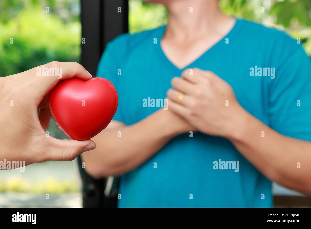 Clutching chest hires stock photography and images Alamy