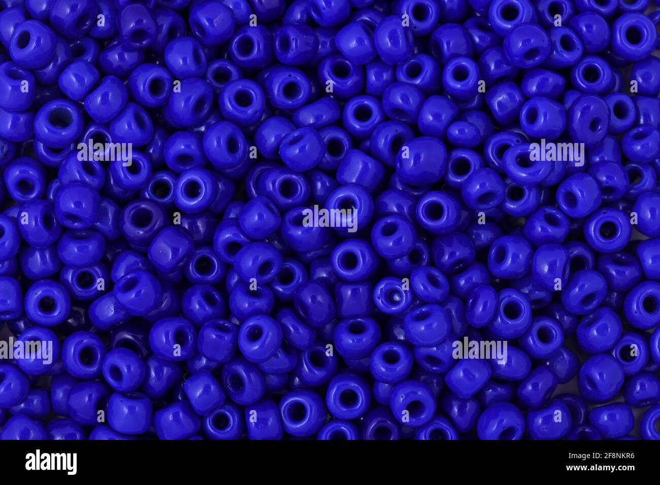 Blue Beads on the white background Background Close up, macro, make bead necklace Stock Photo