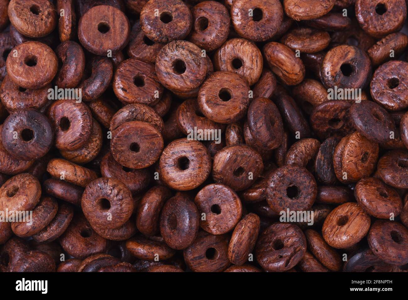 Wooden beads close up background Stock Photo