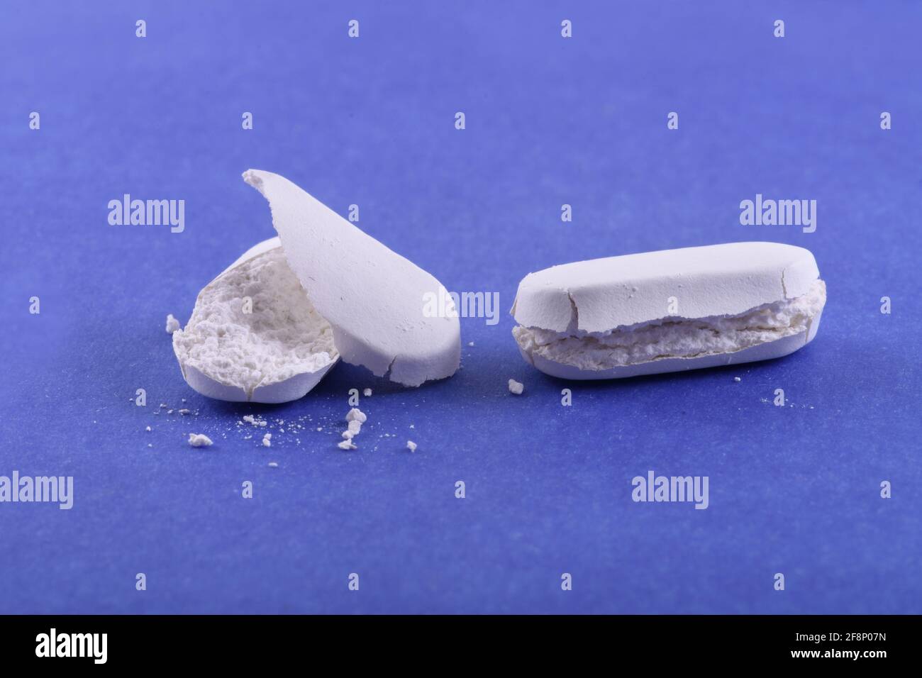 Expired Tablets on blue background Stock Photo Alamy