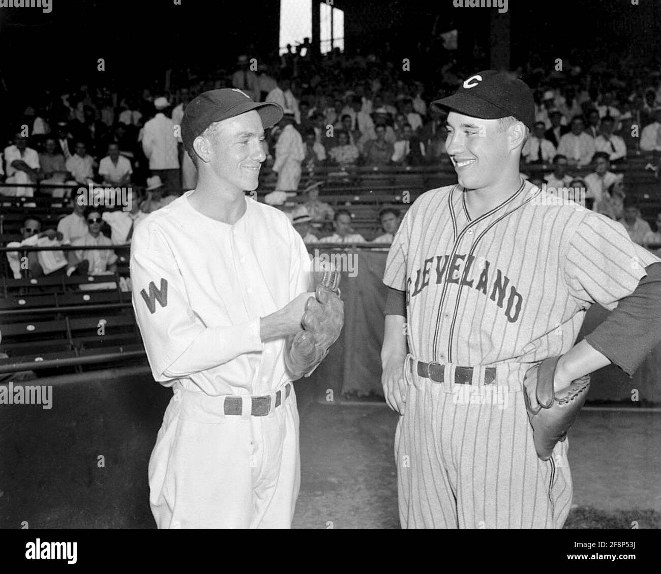 Bucky Jacobs, rookie Washington's Senators from Richmond, VA. and Bob Feller, Cleveland Indians, 2 August 1937. Stock Photo
