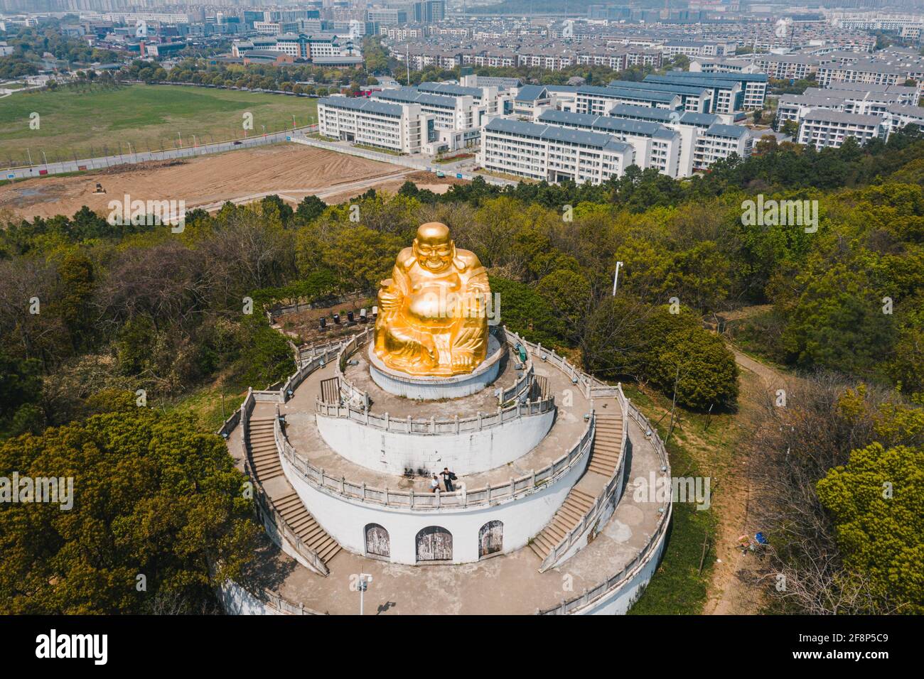 Aerial view of the golden big buddha in Shangfang Mountain in Suzhou ...