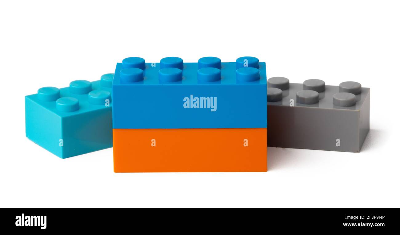 Colorful plastic toy building blocks isolated on white Stock Photo - Alamy