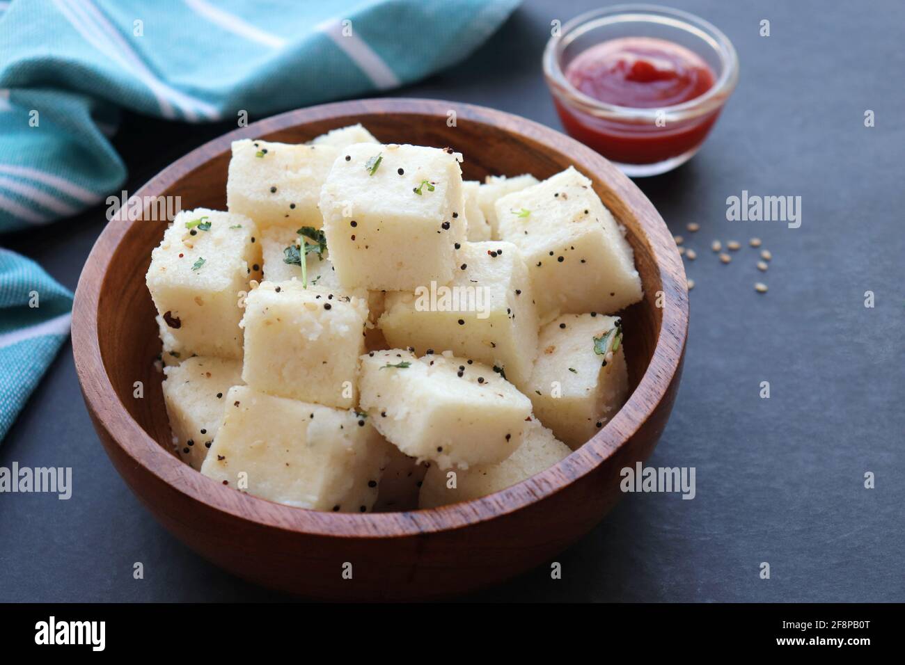 Indian popular Gujrati breakfast dish White Dhokla, Khatta Dhokla, Rice and Urad Dal Khaman