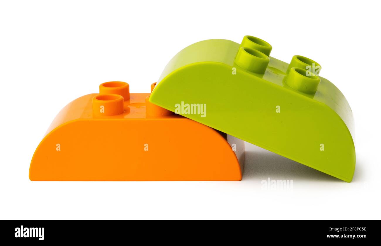 Colorful plastic toy building blocks isolated on white Stock Photo - Alamy