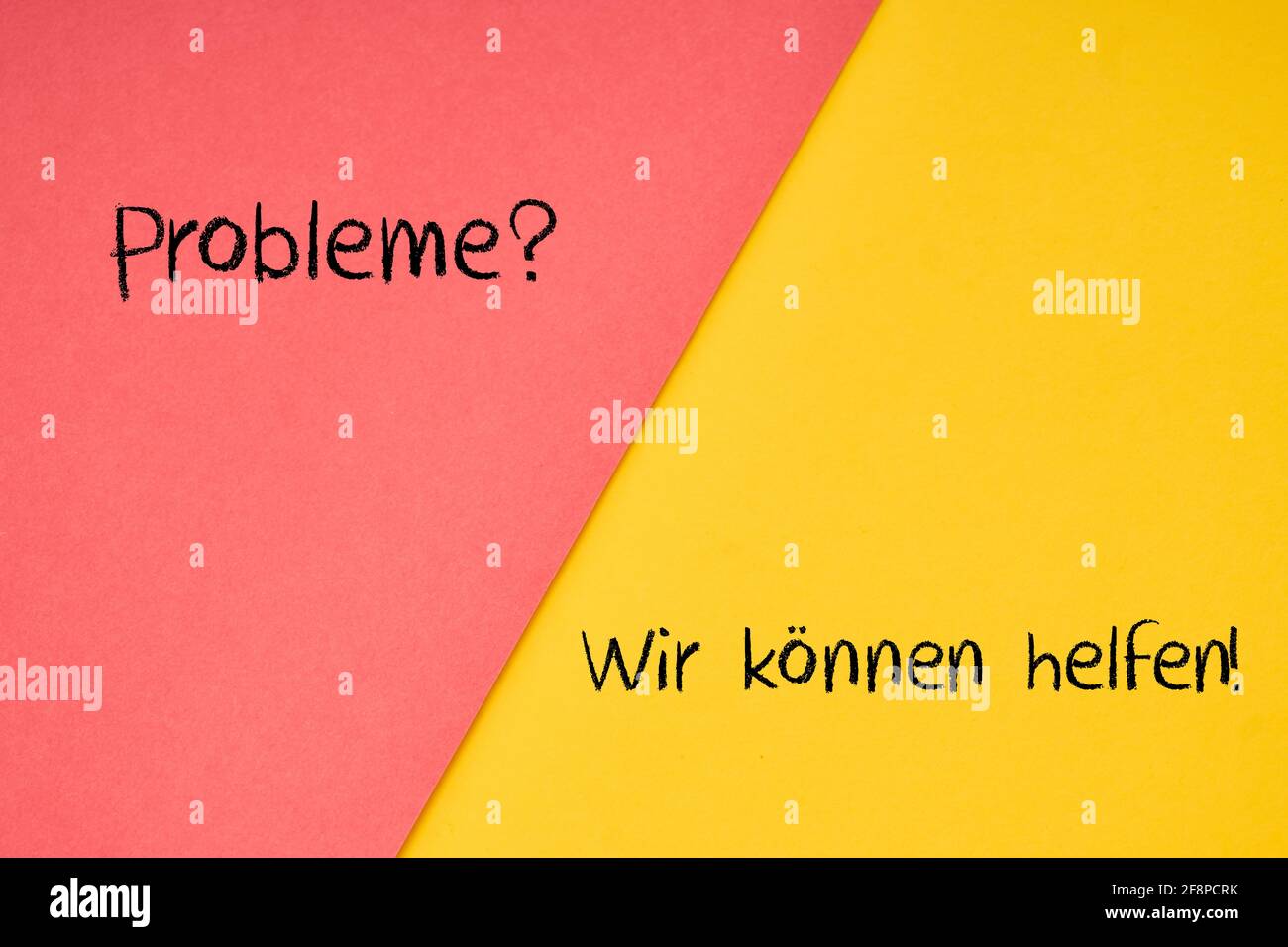 Red and yellow background 'Probleme? - Problems? / Wir konnen helfen! - We can help!' Stock Photo