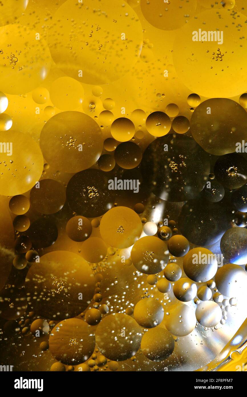Colorful bubbles from oil in water in a macro shot Stock Photo Alamy