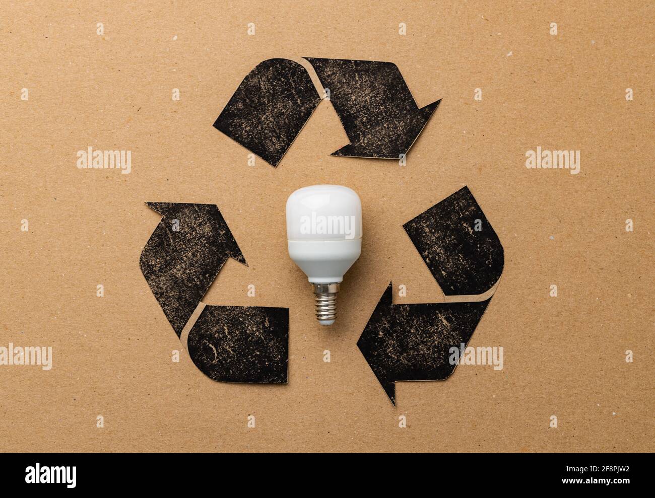 LED light bulb with recycle symbol on craft paper Stock Photo Alamy