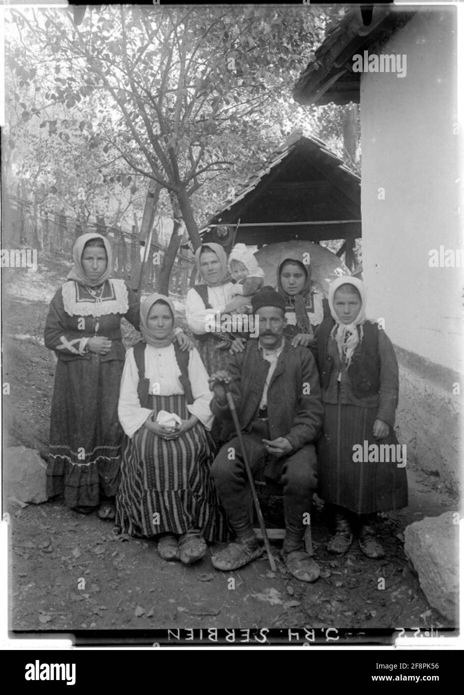 The 'Kmet' ('old man') of Silvova with his family Serbia; photographer: Infanterie-Regiment Nummer 4. Stock Photo