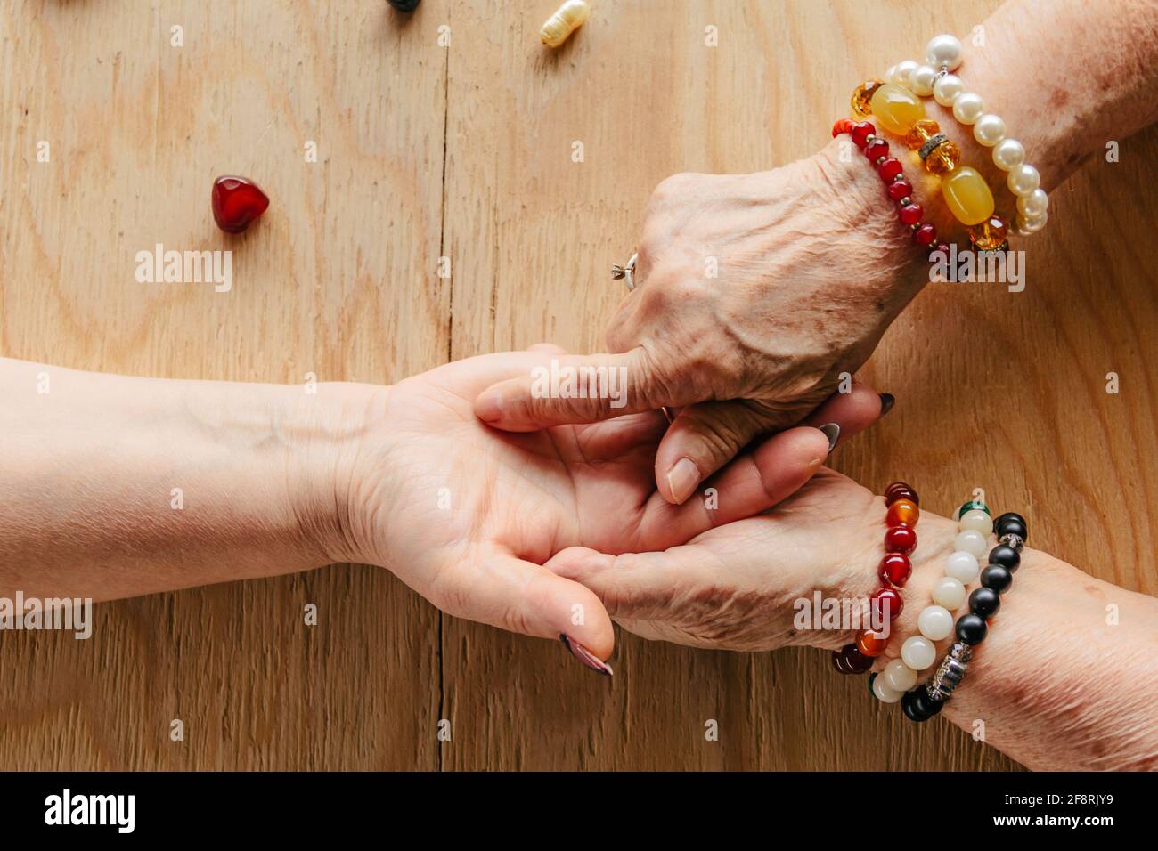 Grandma magic, fortune telling, palmistry. Chiromancy, women hands, destiny reading Stock Photo