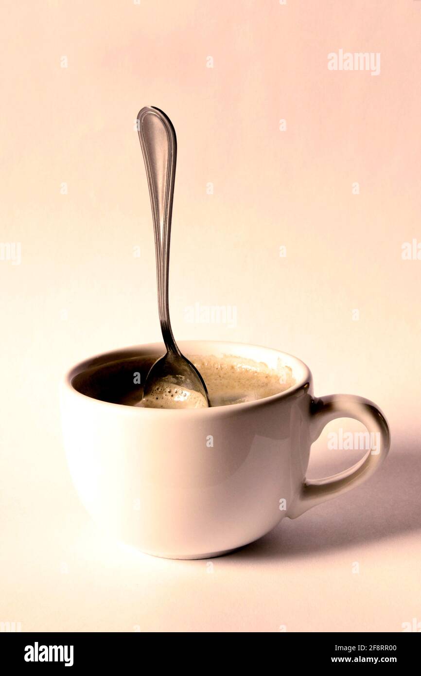 strong coffee, coffee spoon standing in the coffee Stock Photo