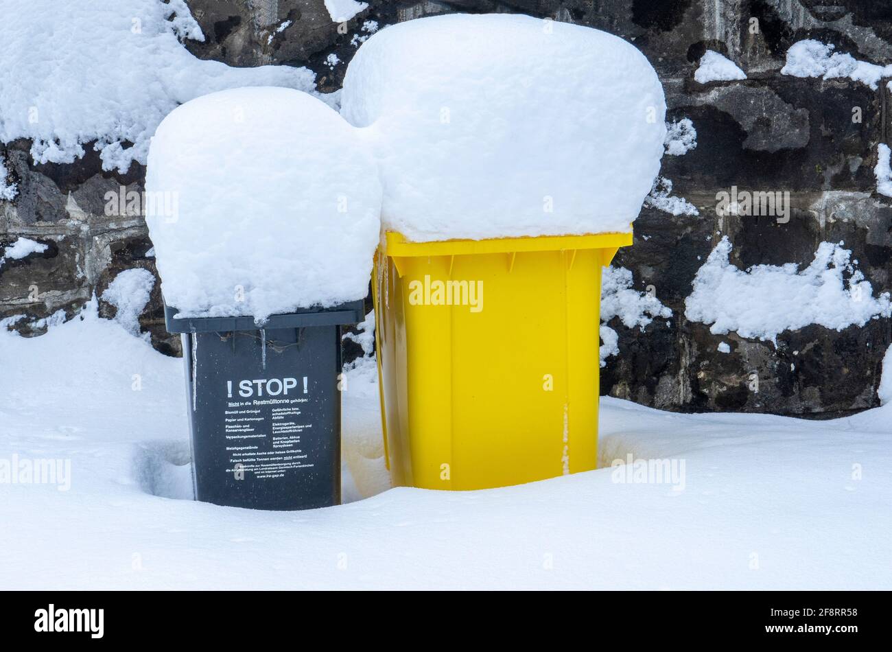 waste bins covered in snow, Germany, Bavaria, Oberbayern, Upper Bavaria Stock Photo