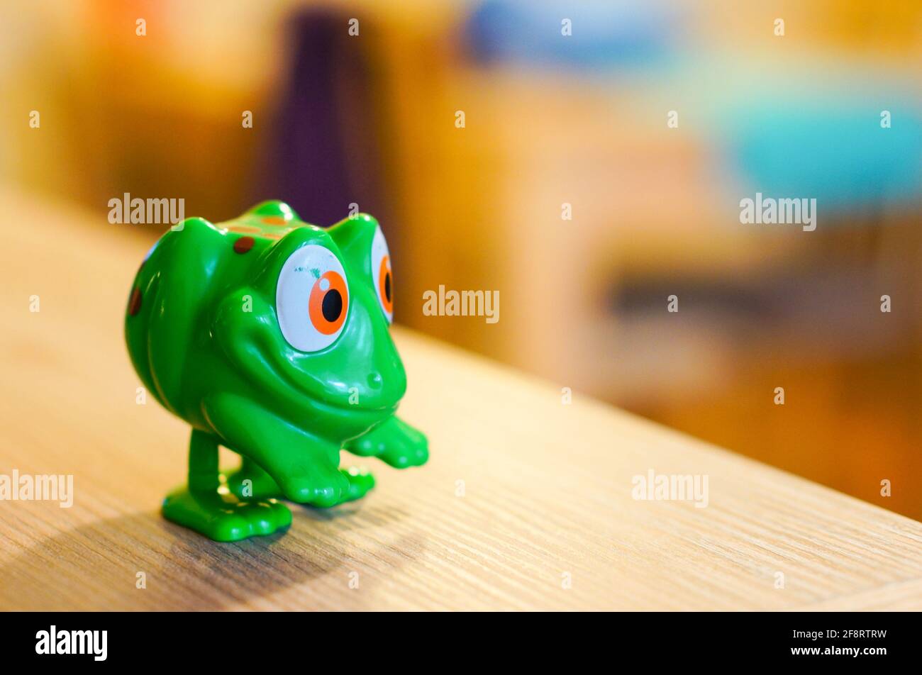 Green plastic frog toy hi-res stock photography and images - Page, rubber  frog
