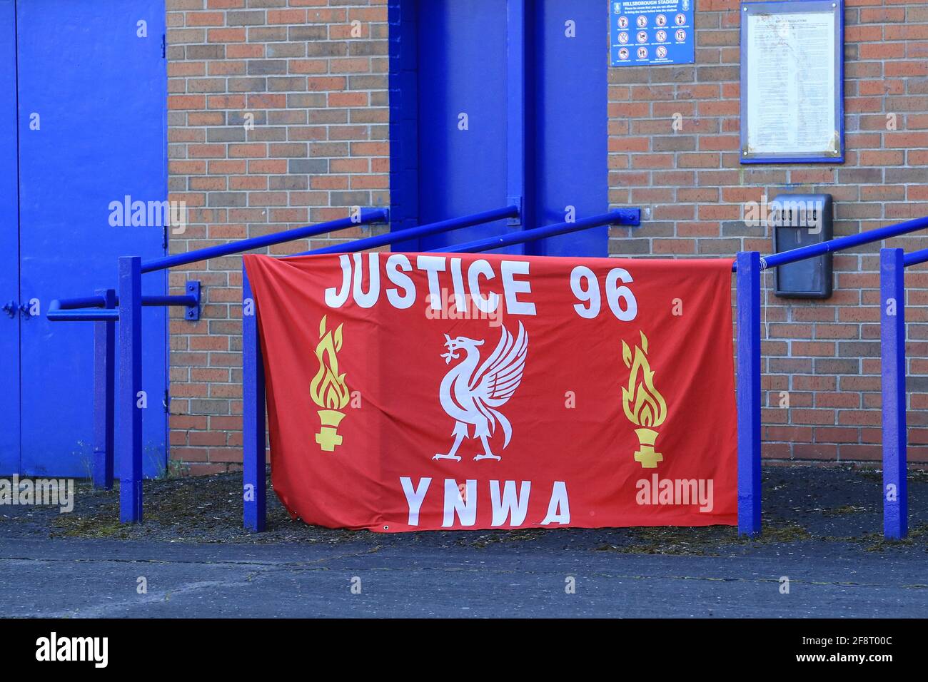 Sheffield, UK. 15th Apr, 2021. A Liverpool flag with ‘Justice 96, YNWA' is wrapped over the hand rail at Hillsborough to remember the 96 men, women and children who lost their lives attending the FA Cup semi final between Liverpool and Nottingham Forest 32 years ago to the day in Sheffield, UK on 4/15/2021. (Photo by Mark Cosgrove/News Images/Sipa USA) Credit: Sipa USA/Alamy Live News Stock Photo