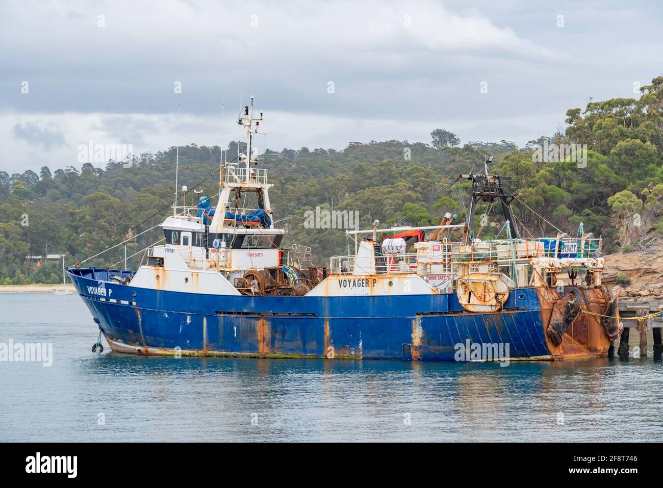 Fishing Vessel is a 321 gross ton and 200 deadweight tons ship seen here moored at the Port of Eden on the New South Wales south coast of Australia Stock Photo