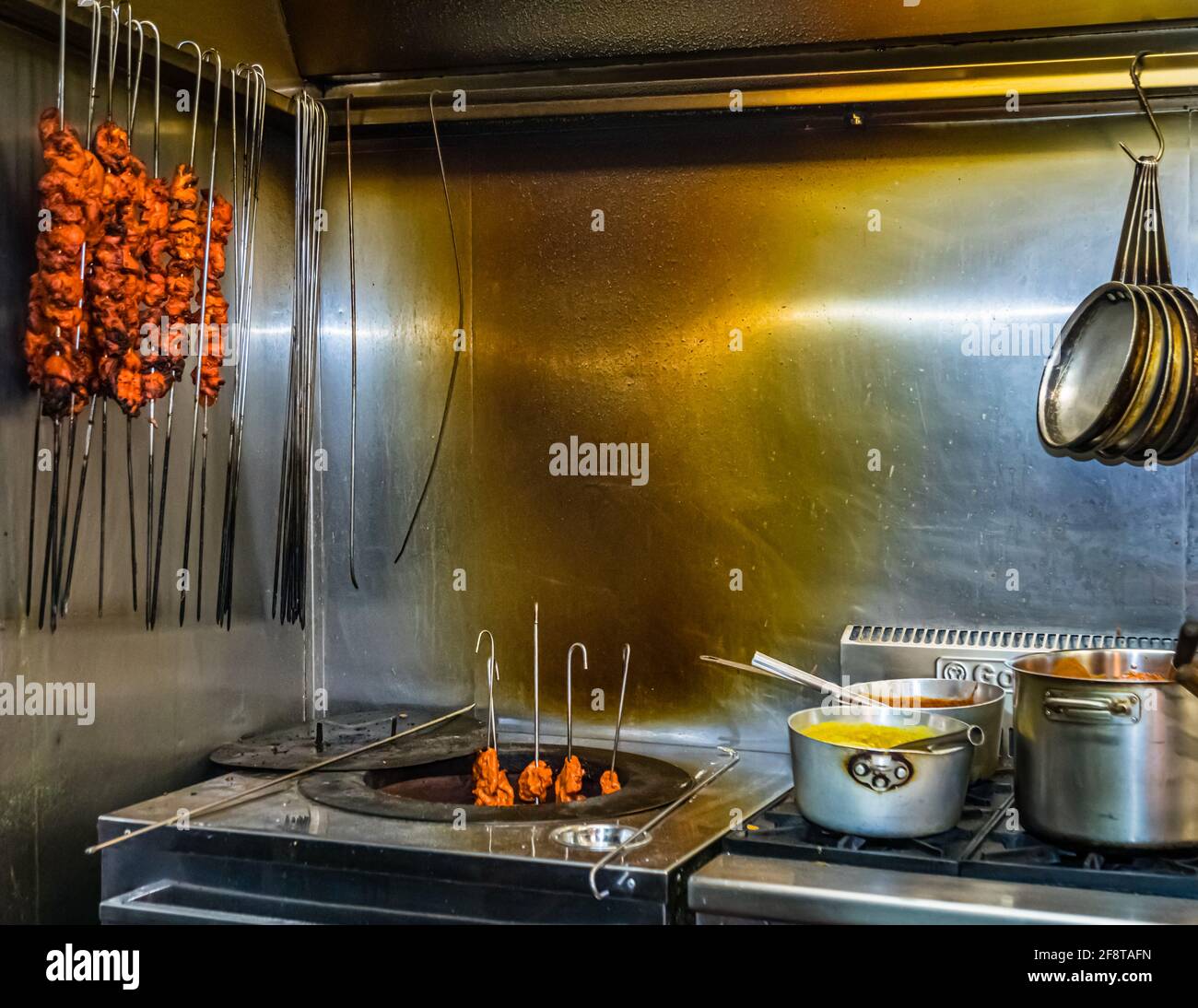 In the tandoori oven even spices are roasted Stock Photo