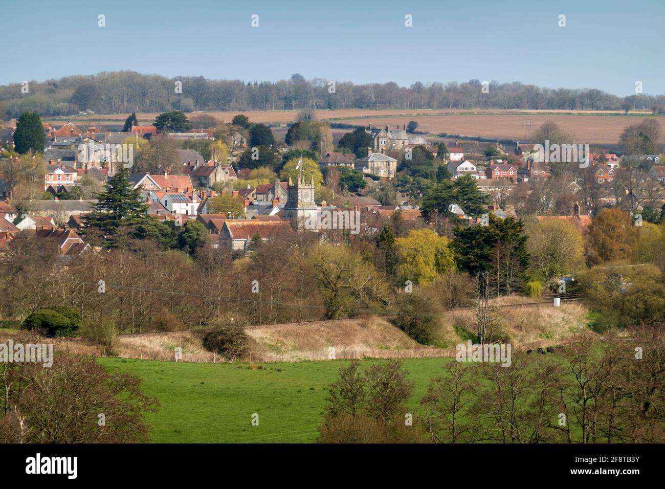 View in spring morning sunshine over the village of Tisbury, Cranborne Chase AONB, Wiltshire, England, United Kingdom, Europe Stock Photo