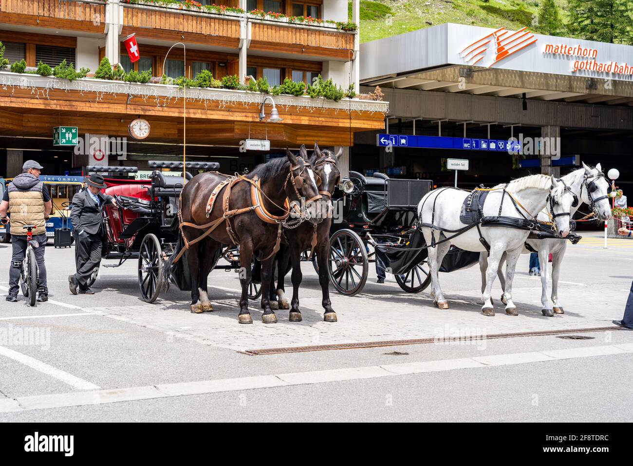 ZERMATT, SWITZERLAND JUNE 22, 2019 Horse carriage vehicle for tourists riding in Zermatt town